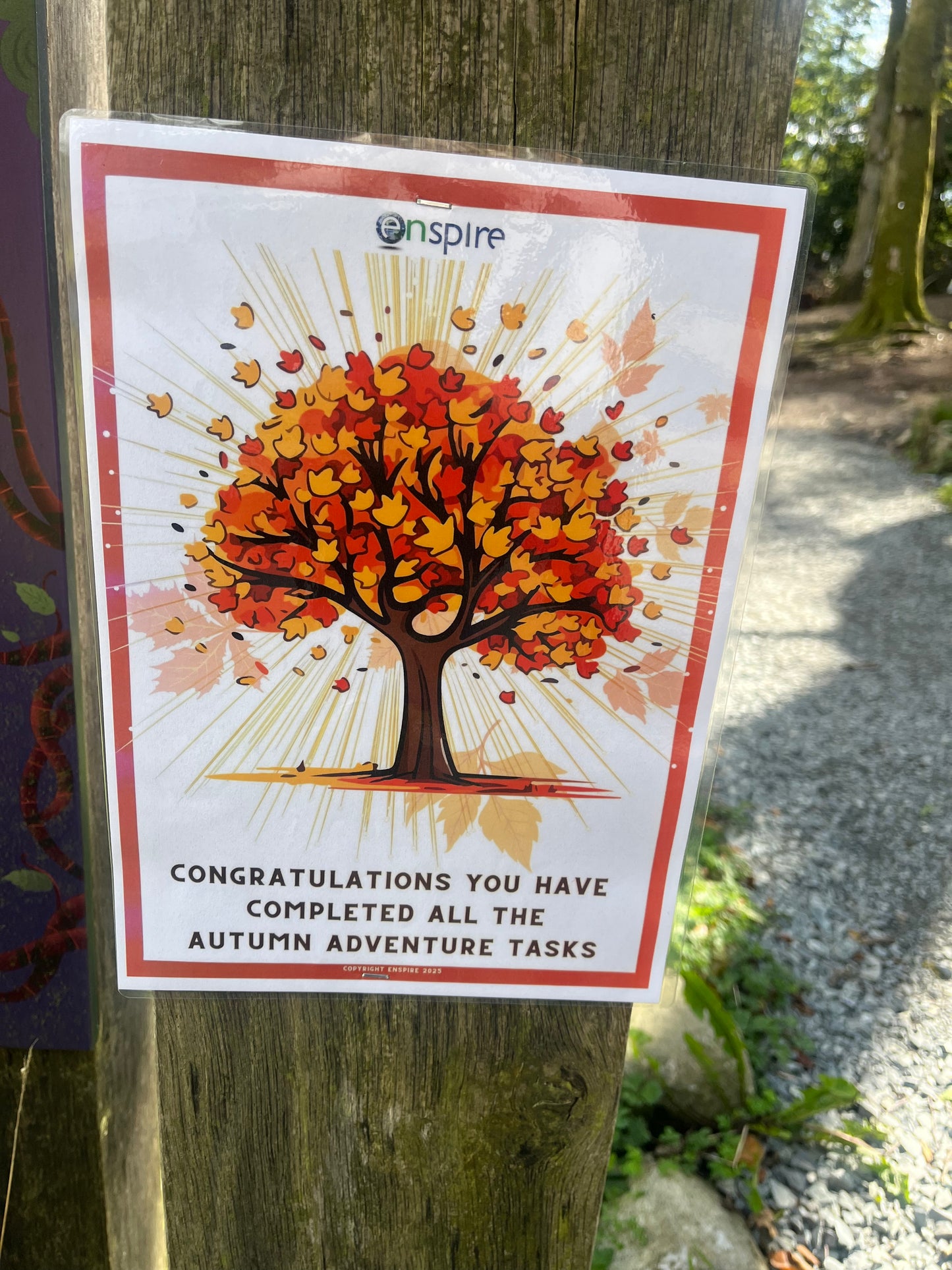 Sticker on a tree with an autumn design and text congratulating completion of tasks.